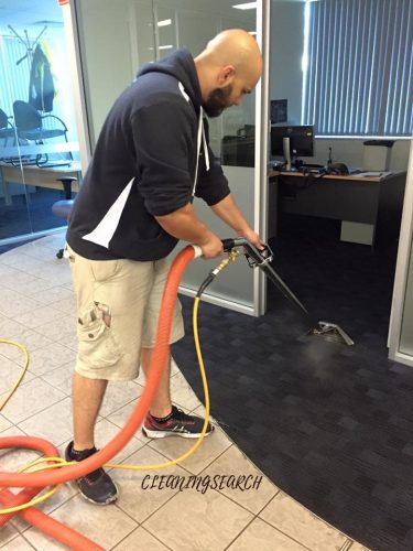 Carpet Cleaner doing job in office
